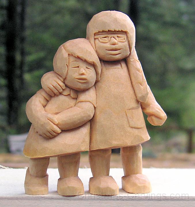 sisters wood carving